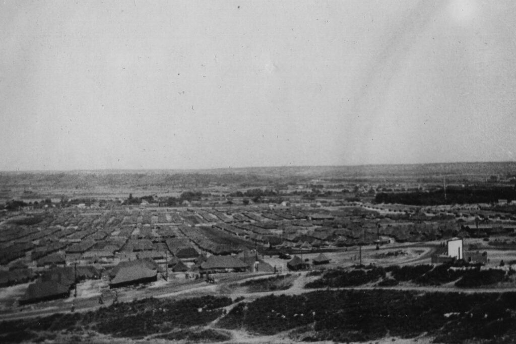 B&W photo of tents at Camp Lucky Strike
